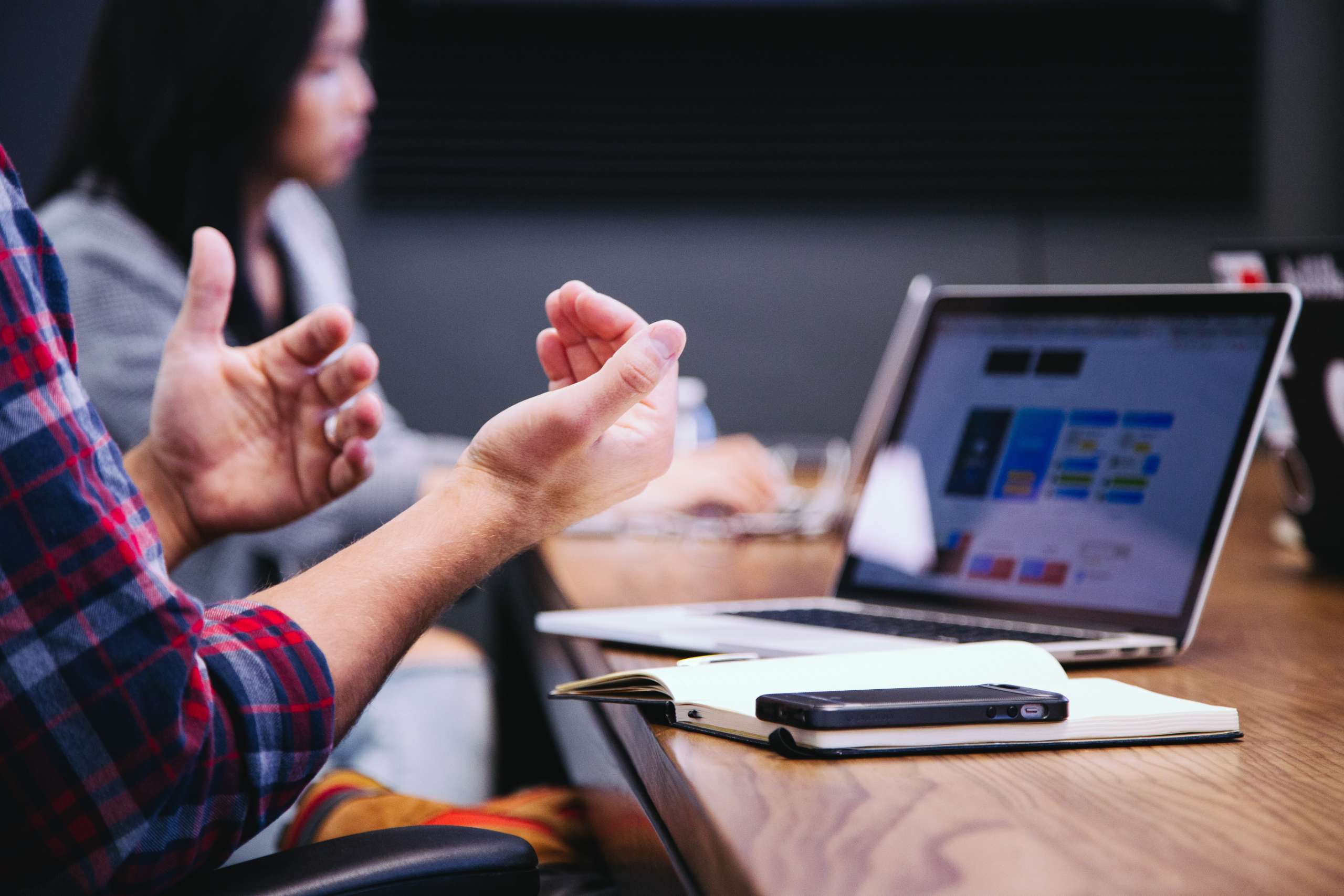 Man gesturing in meeting