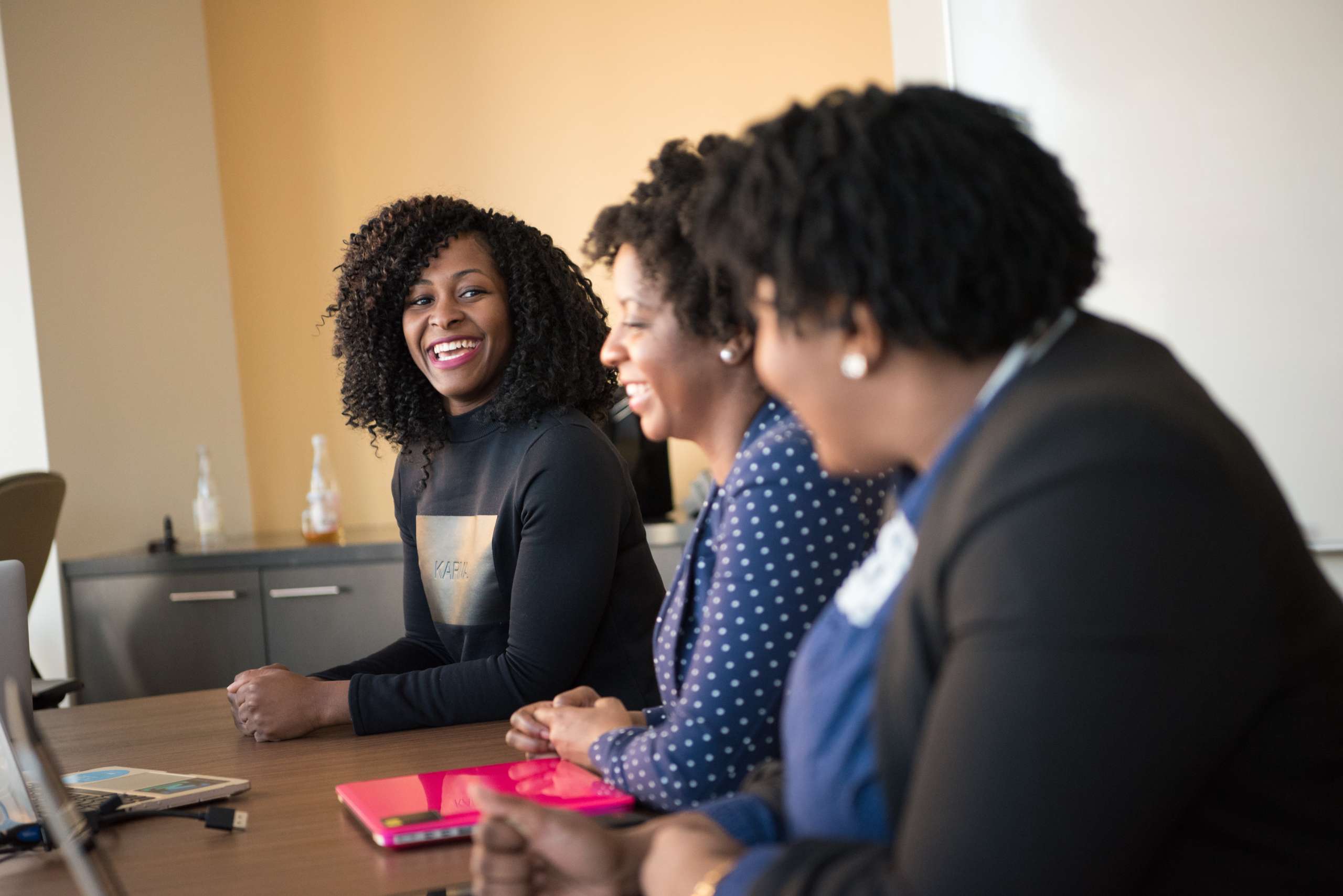 Women talking and laughing